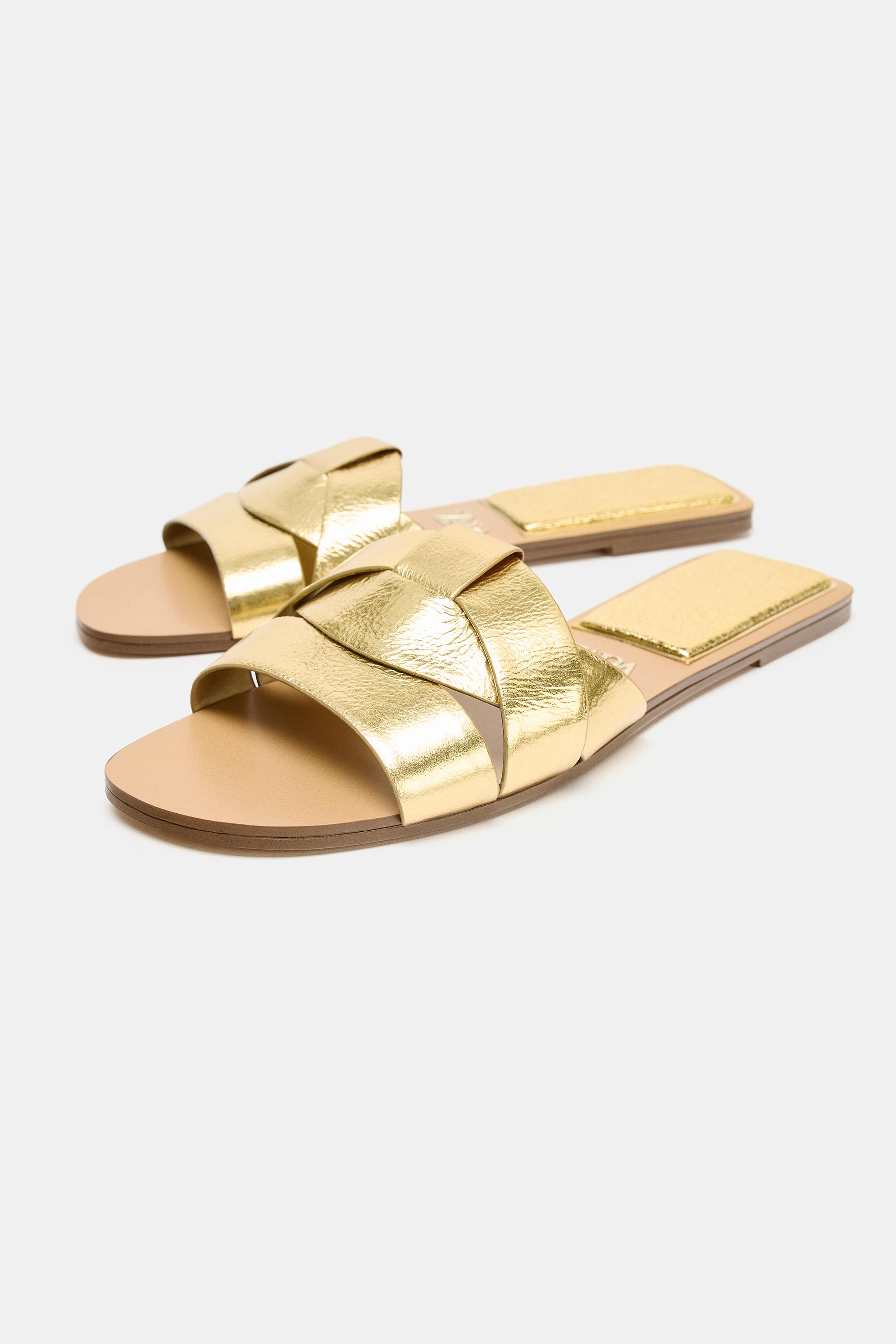FLAT CROSSED LEATHER SANDALS